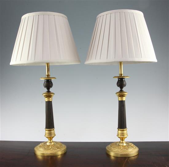 A pair of French Empire style bronze and ormolu table lamps, 18.5in.